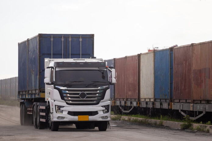 Freight car trailer with cargo container and freight train with